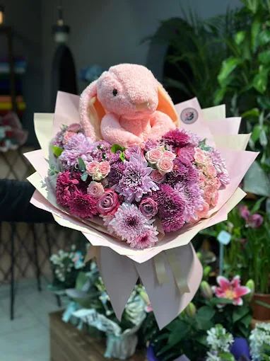 Pelüş oyuncaklı pembe çiçek buketi